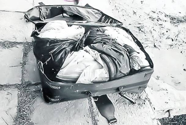 Hao Jing Scheng a fost ucis şi îndesat într-o valiză