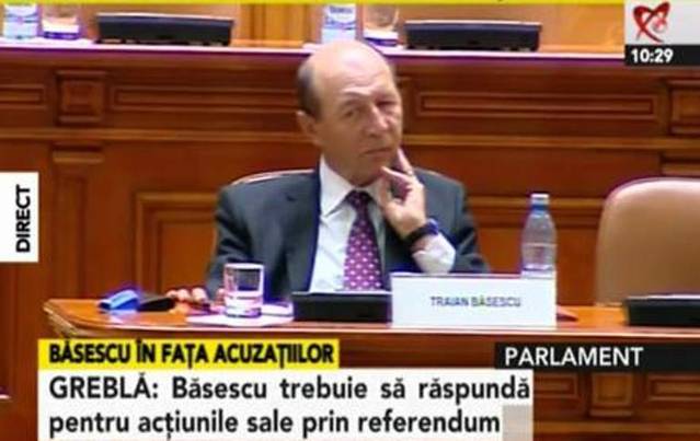 Basescu în Parlament la şedinţa pentru suspendarea sa din funcţie Basescu în Parlament la şedinţa pentru suspendarea sa din funcţie