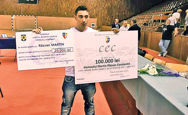 A luat banii, nu casa! Halterofilul Răzvan Martin a fost premiat pentru bronzul câştigat la Olimpiada de la Londra! VEZI CÂT A ÎNCASAT!