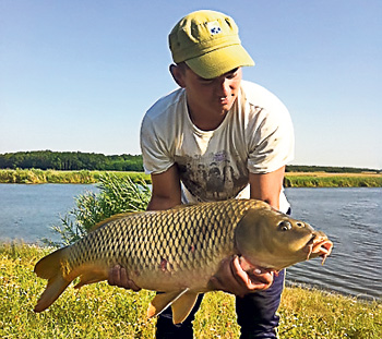 PESCUIT | Povestea unui amur de 23 kg prins pe Dunăre, la Giurgiu