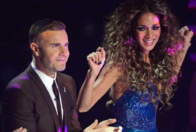 S-au ameninţat cu bătaia la TV! Răduleasca tăvălită prin făină e «mic copil» pe lângă ce-au făcut Mariah Carey şi Nicki Minaj pentru audienţă