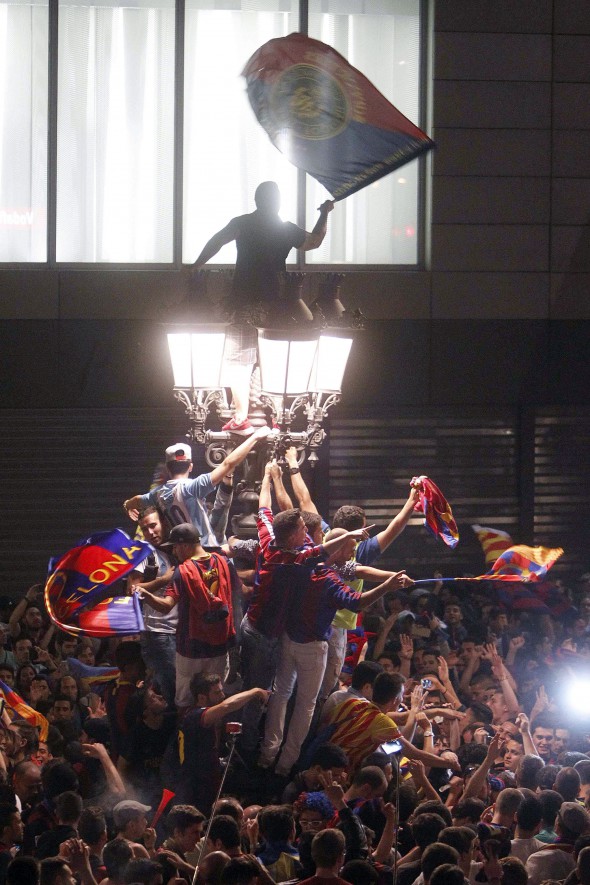 FC Barcelona's supporters celebrate as champions