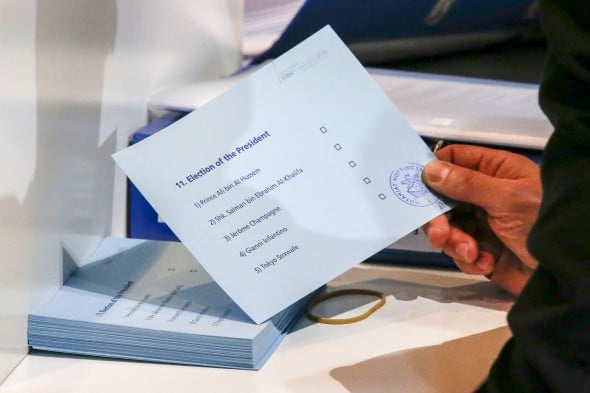 epa05181861 A notary holds a ballot paper with the names of the five candidates for FIFA President during the Extraordinary FIFA Congress 2016 held at the Hallenstadion in Zurich, Switzerland, 26 February 2016. The Extraordinary FIFA Congress is being held in order to vote on the proposals for amendments to the FIFA Statutes and choose the new FIFA President. EPA/PATRICK B. KRAEMER