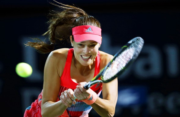 epa05166545 Ana Ivanovic of Serbia returns the ball to Simona Halep of Romania during their second round match of the Dubai Duty Free Tennis WTA Championships in Dubai, United Arab Emirates, 17 February 2016. EPA/ALI HAIDER