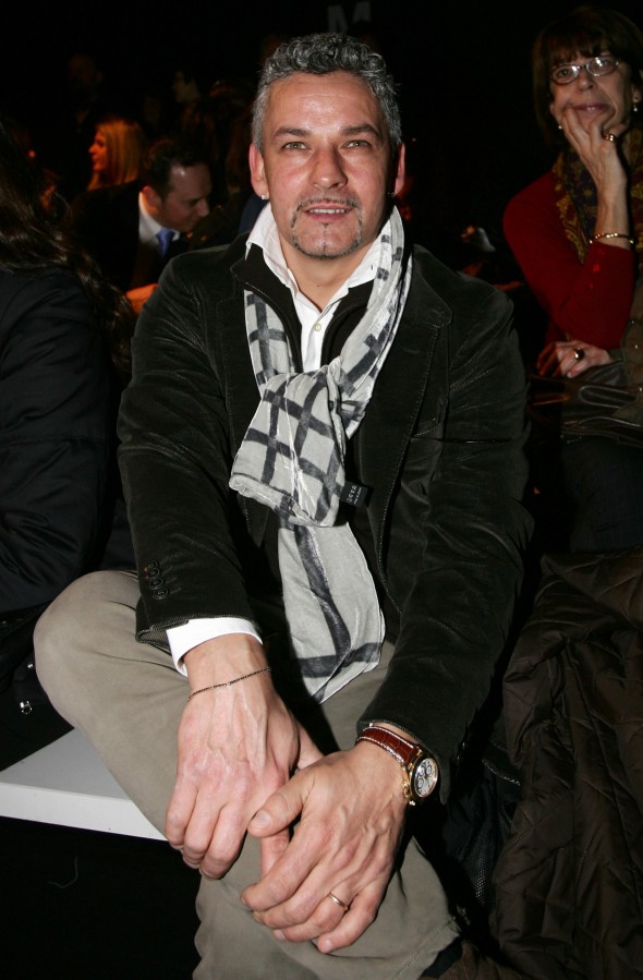 epa02054017 Italian former soccer player Roberto Baggio attends the presentation of the Fall/Winter 2010/2011 collection of Italian designer Luciano Soprani during the Milan Fashion Week in Milan, Italy, 25 February 2010. The Milan Fashion Week runs from 23 February to 02 March. EPA/MATTEO BAZZI