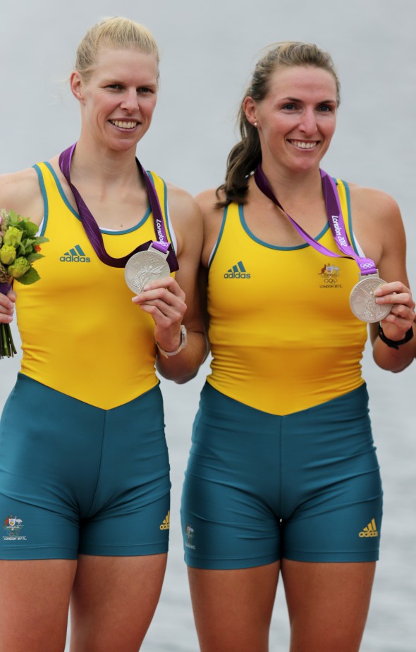 epa03331972 Australia's Kate Hornsey (R) and Sarah Tait celebrate their silver medals after the Women's Pair during the London 2012 Olympic Games Rowing competition at the Eton Dorney rowing centre near the village of Dorney, west of London, Britain, 01 August 2012. EPA/JIM HOLLANDER
