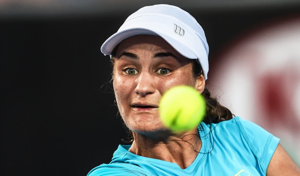 epa05112865 Monica Niculescu of Romania in action against Elizaveta Kulichkova of Russia during their second round match at the Australian Open Grand Slam tennis tournament in Melbourne, Australia, 20 January 2016. EPA/FILIP SINGER
