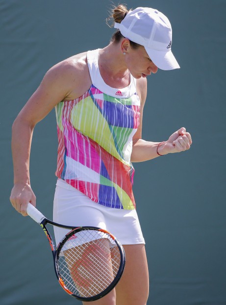 epa05232081 Simona Halep of Romania reacts against Julia Goerges of Germany during their third round match at the Miami Open tennis tournament on Key Biscayne, Miami, Florida, USA, 26 March 2016. EPA/ERIK S. LESSER