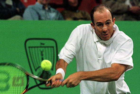 BRU045-19980220-ANTWERP, BELGIUM - American Jeff Tarango returns the ball to Australian Patrick Rafter to during their European Community Championships quarter final match in Antwerp late 20 February. Rafter survived his second match in a month against US Jeff Tarango and scored a 6-7 (1/7), 6-2, 6-1 win. EPA PHOTO BELGA/Jacques Collet