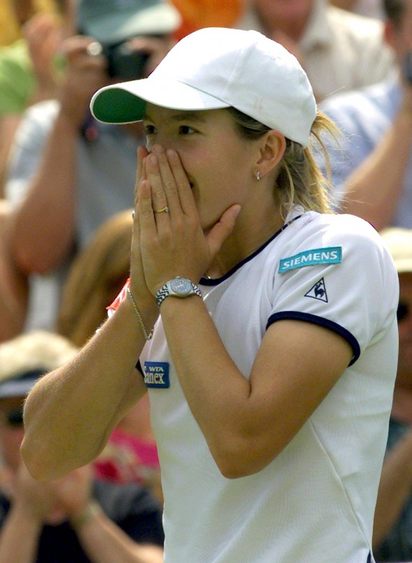 WIM25 - 20010705 - LONDON, UNITED KINGDOM : Belgian Justine Henin celebrates after winning her semi final match against US player Jennifer Capriati at the All England Tennis Championships in Wimbledon, Thursday 05 July 2001. Henin won 2-6, 6-4, 6-2. EPA PHOTO EPA/GERRY PENNY