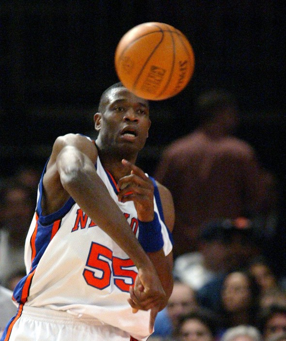 New York Knicks Dikembe Mutombo grabs a rebound and passes the ball to his Knick teammates during game action against the Chicago Bulls Wednesday 07 April 2004 at Madison Square Garden in New York. Knicks defeated the Bulls 96-82.  EPA/JASON SZENES